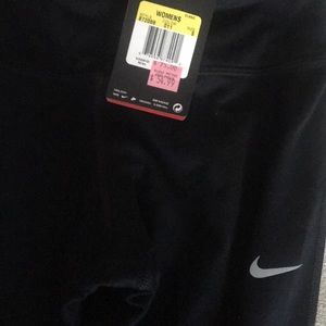 Nike epic run tight fit crop pants. Tags still on.